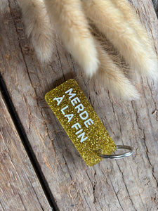 PORTE CLÉS "MERDE À LA FIN"