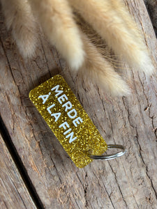 PORTE CLÉS "MERDE À LA FIN"
